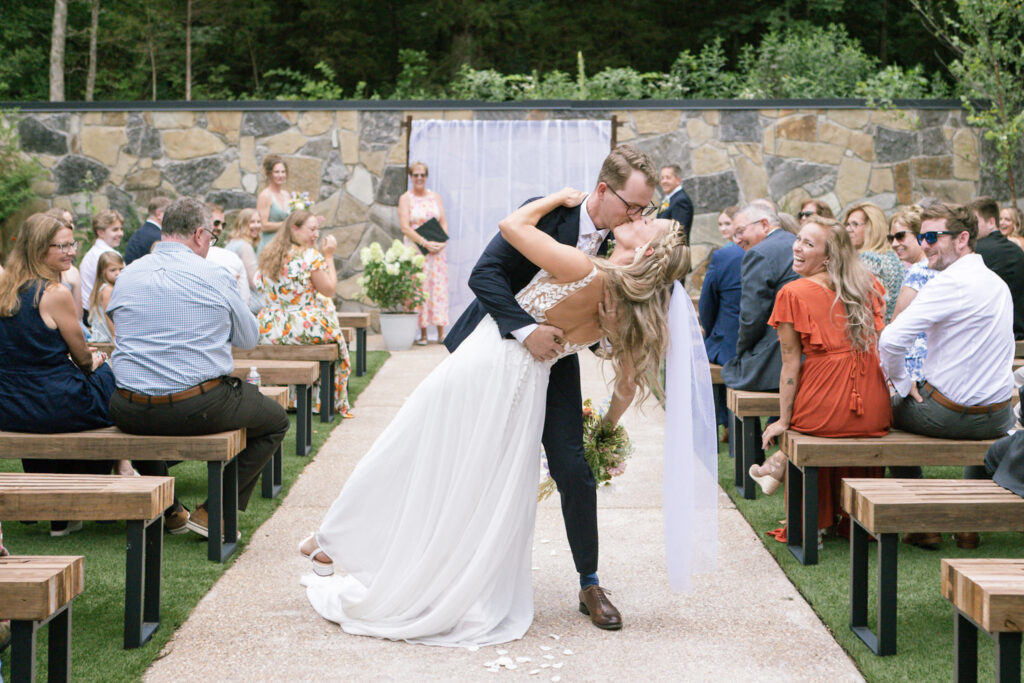 Chelsea Stanford Photographer Springfield MO Dip at end of aisle Juniper Gardens, Hillside location Fair Grove, MO